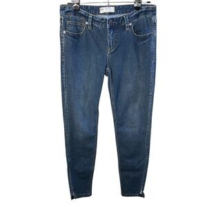 Free people dark wash slim leg jeans with slit hem size 26